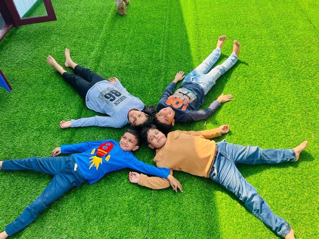 Kids Having Fun on the Green Deck