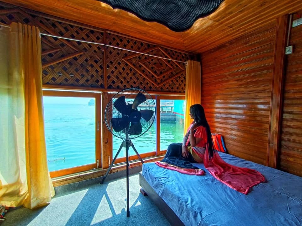 Scenic Bedroom View with Water Landscape