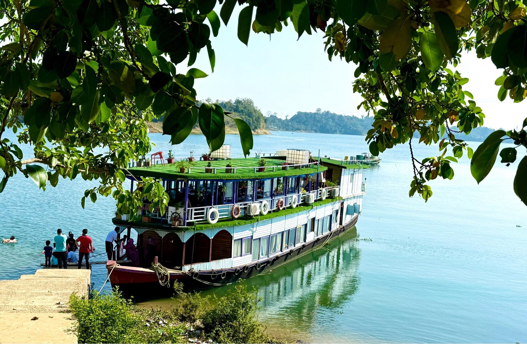 The Majestic Houseboat Moored at the Bank
