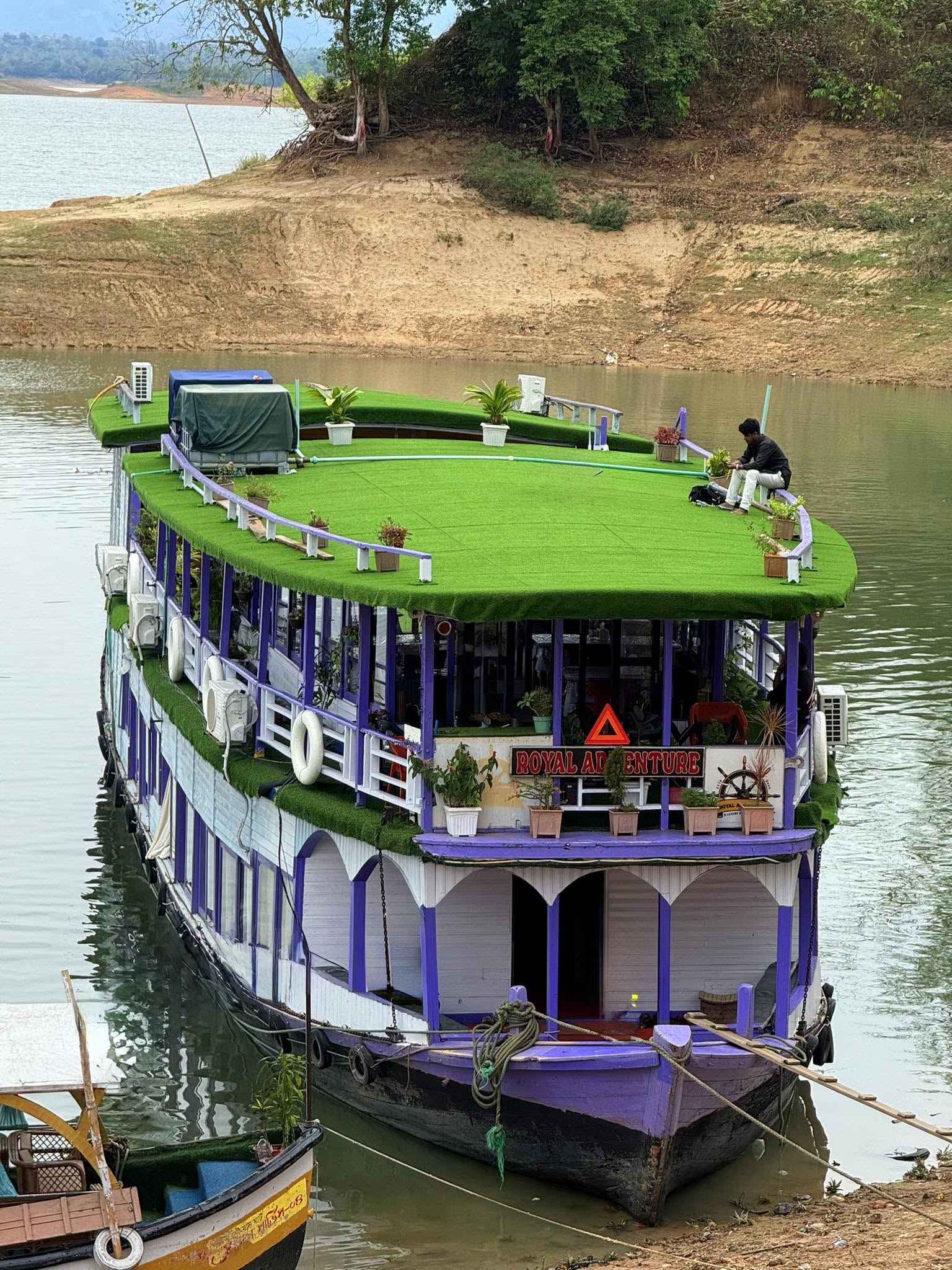 Relaxing on the Green Rooftop of the Docked Boat