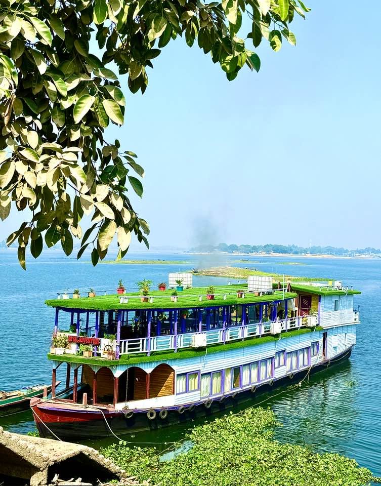 The Royal Boat Gliding Through the Blue Waters